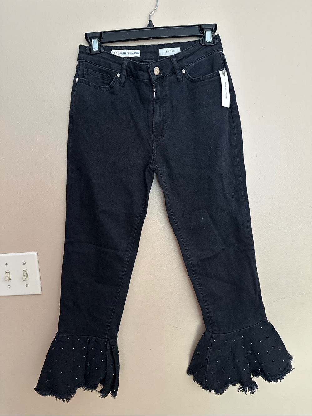 Pilcro Black Flare Jeans with Studded Ruffle Hem